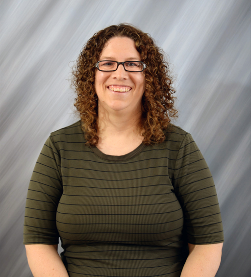 Photo of Katie from the waist up. 